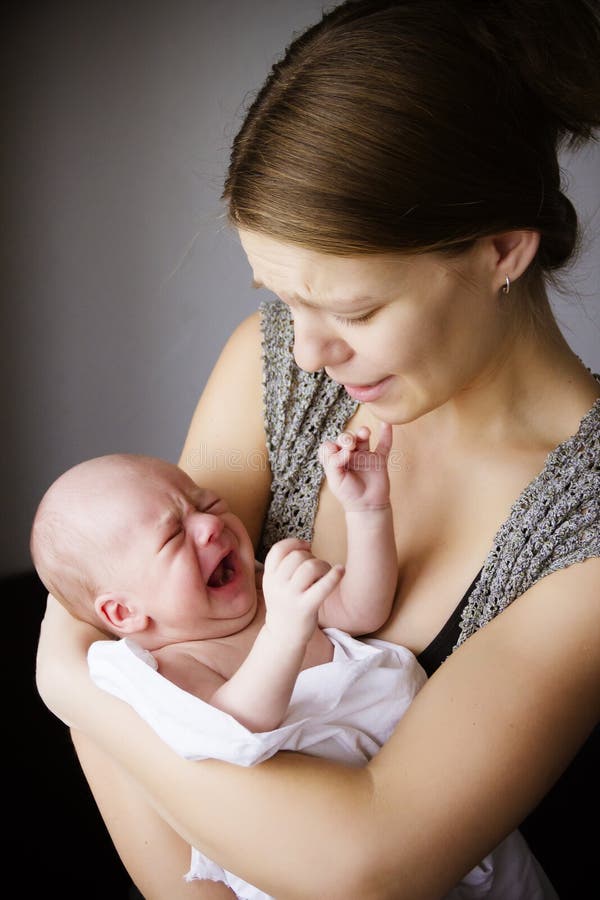 Mother and the baby cry together