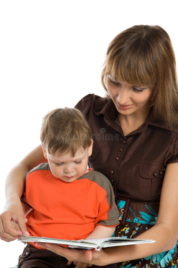 Mother and baby reading book stock images