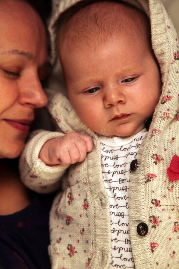 Happy baby with mother stock image. Image of blond, holding 4900069