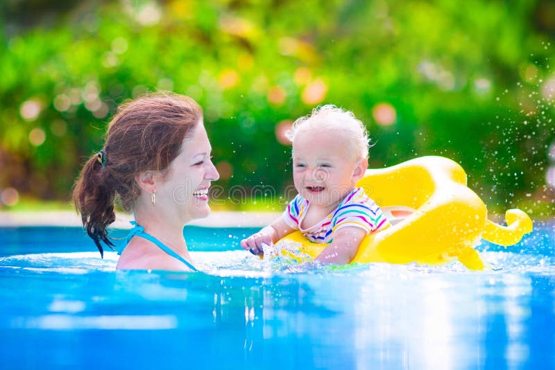 Mother and baby in swiming pool