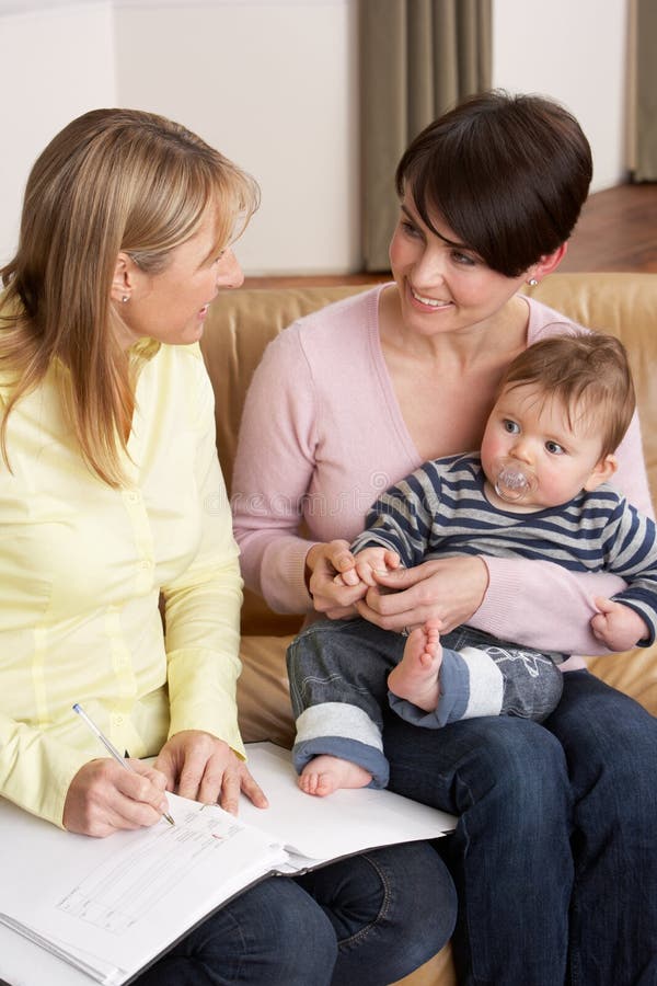 Health Visitor Talking To Mother with Young Baby Stock Image Image of