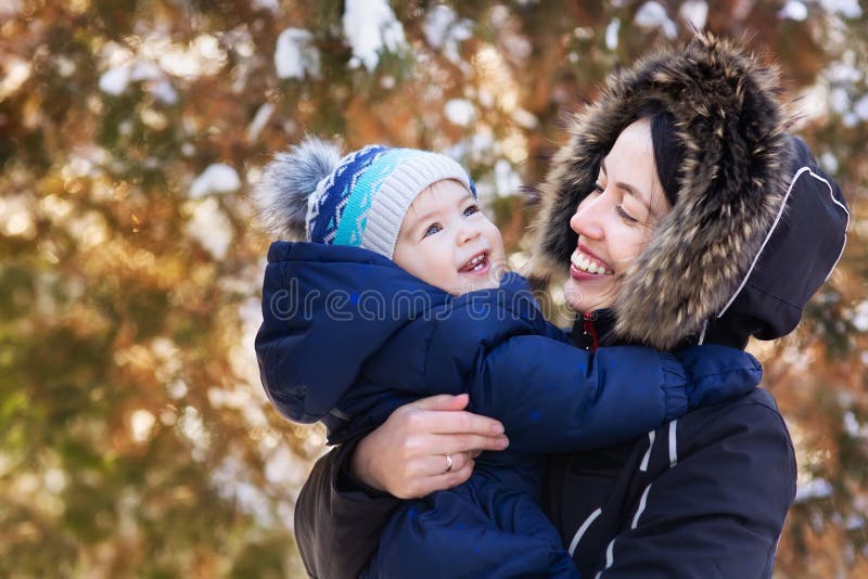 Mother and baby on winter walk