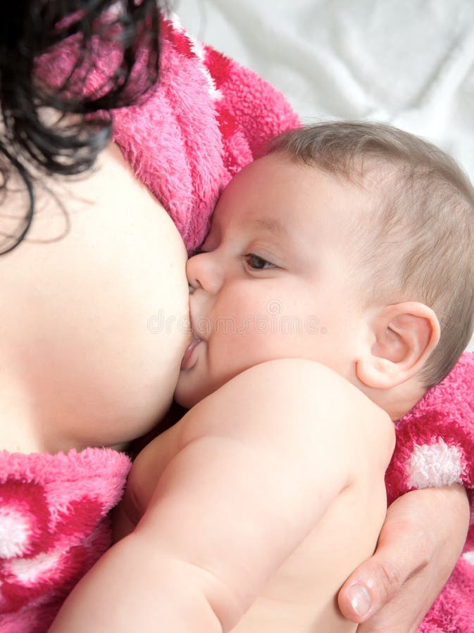 Breast Feeding Two Little Sisters Twin Baby Girls Stock Photo