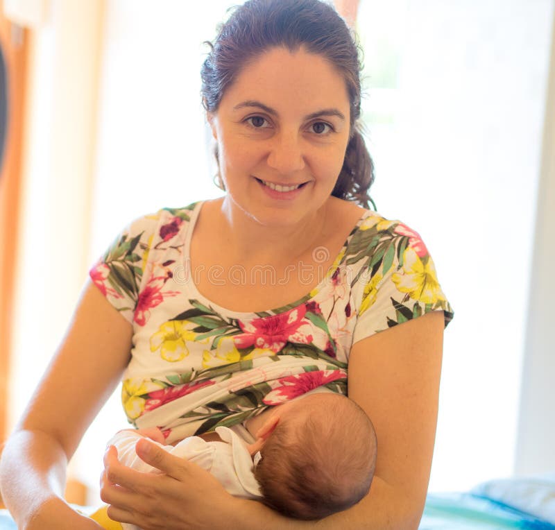 Mother breastfeeding a baby