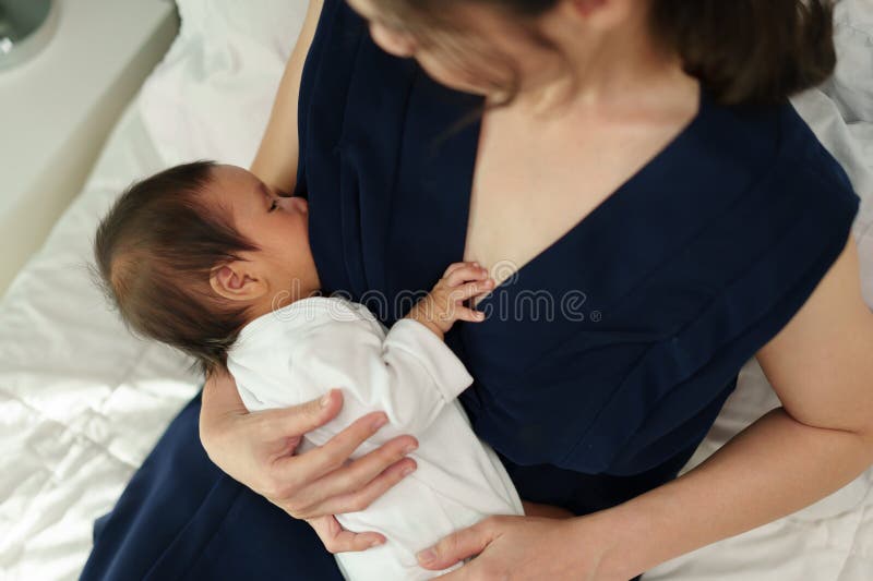 Mother Breastfeeding Newborm Baby on Bed Stock Image Image of drink