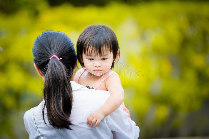 Mother Carries Her Daughter on Her Back Stock Photo Image of concept