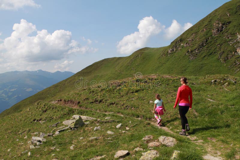 Mother and child family hiking