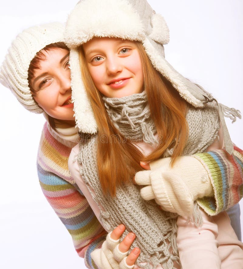 Mother with child in winter hats