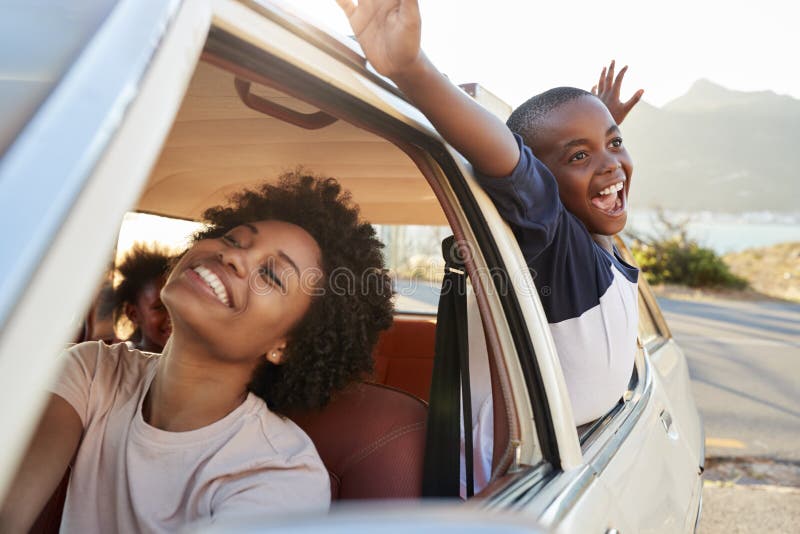 Mother And Children Relaxing In Car During Road Trip stock photography Mother And Children Relaxing In Car During Road Trip stock photography