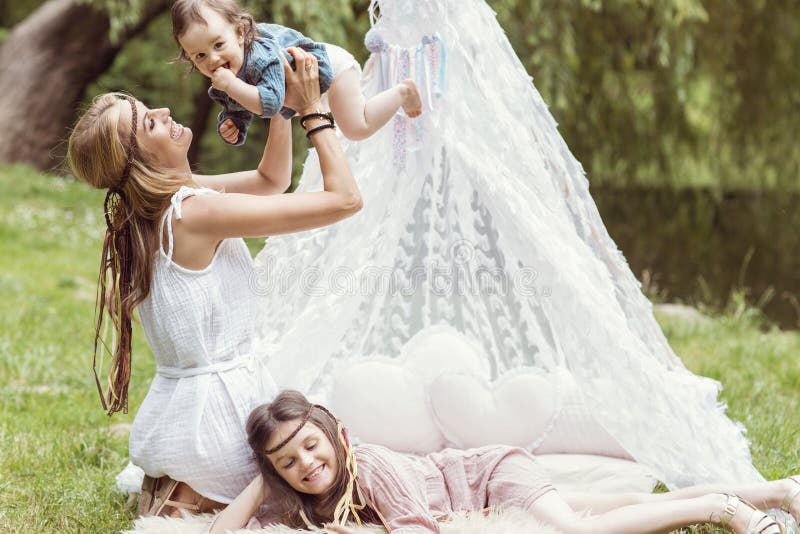 Mother and Children are Sitting in a Tent Teepee Stock Image - Image of  enjoyment, discovery: 126725265