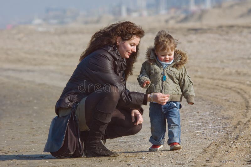 Mother and cute boy on the beach