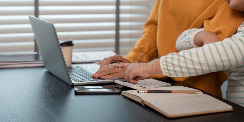Mother and Daughter Bonding Over Laptop at Home, Sharing Quality Time and Learning Together stock photos