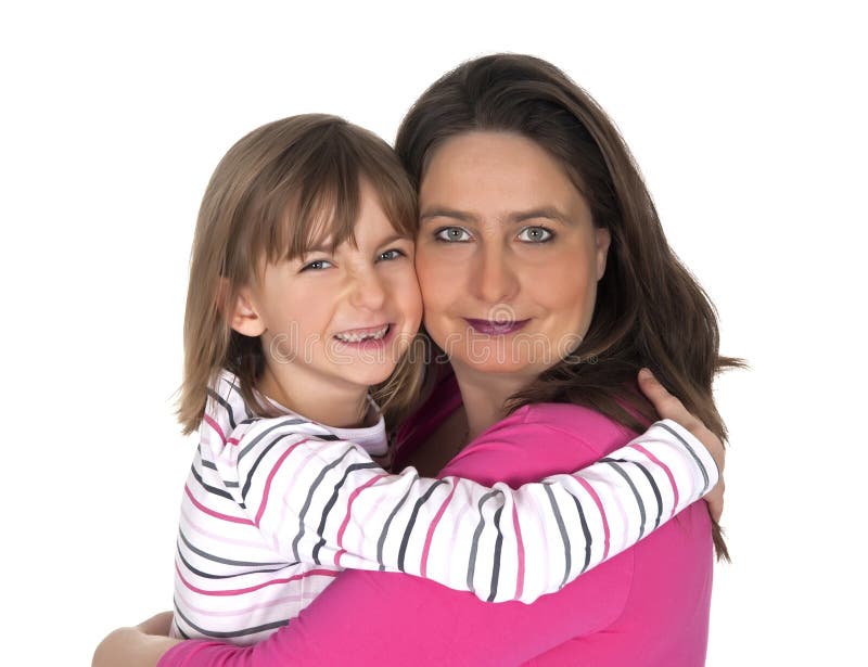 Smiling mother and little daughter embracing each other stock photos 