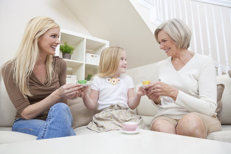 Mother, Daughter, Grandmother Family Drinking Tea