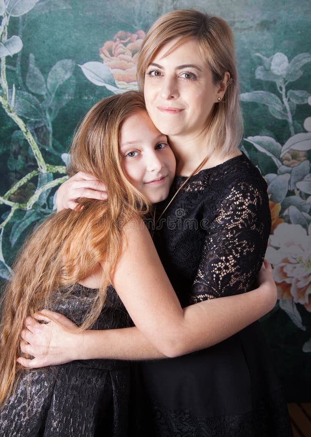 Mother with daughter hugging