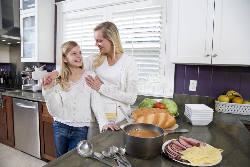 Mother And Daughter In Kitchen Making Lunch Stock Photos Image 14563813