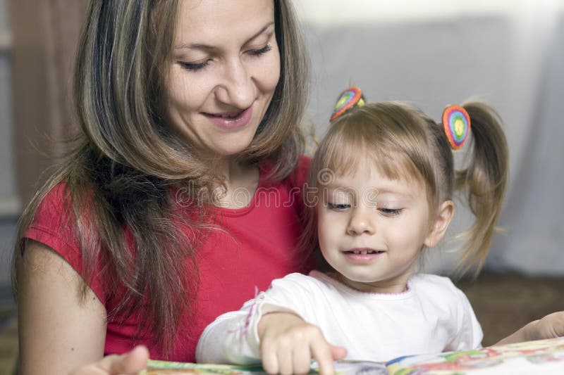 Mother And Daughter Learning At Home