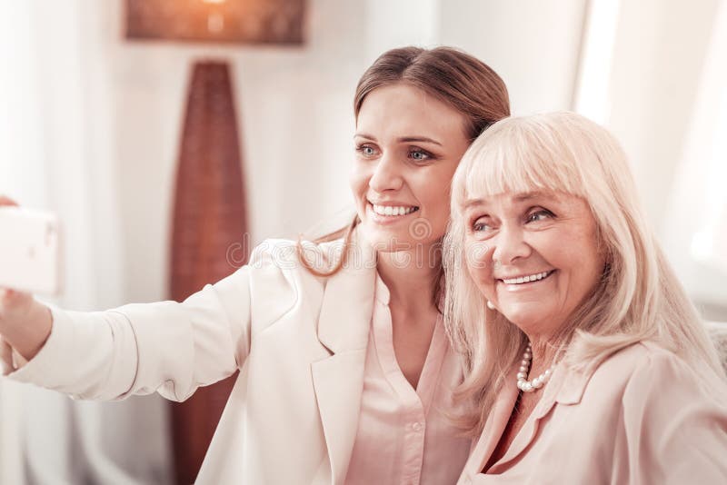 Mother and daughter making photos on a smartphone royalty free stock photos Mother and daughter making photos on a smartphone royalty free stock photos