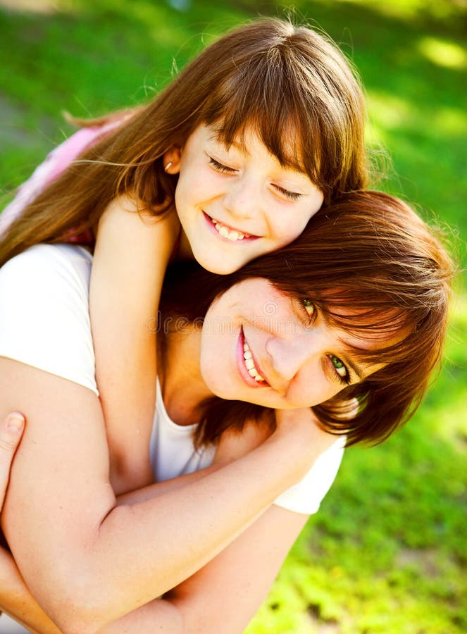 Mother and daughter in park