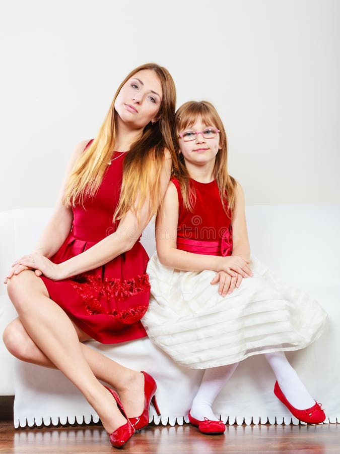 Mother and Daughter Posing Together Stock Photo - Image of mother, girl ...