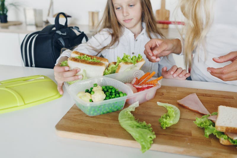 Mother Daughter Preparing School Snack Lunch Home Kitchen Stock Image
