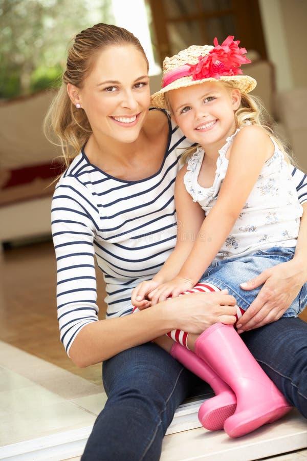 Mother and Daughter Sitting Outside House Stock Image Image of thirties, cute 27705407