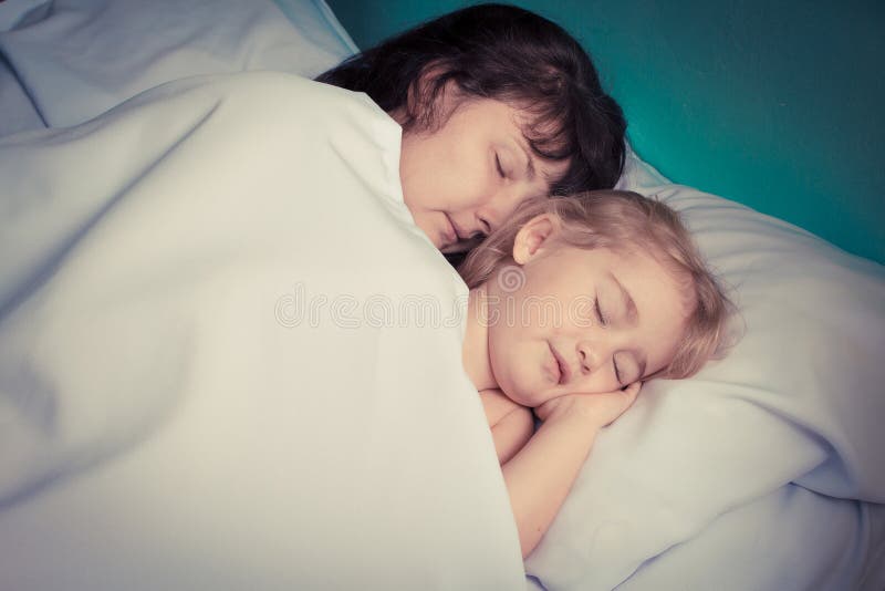 Mother and Daughter Sleeping. Stock Photo Image of baby, bonding