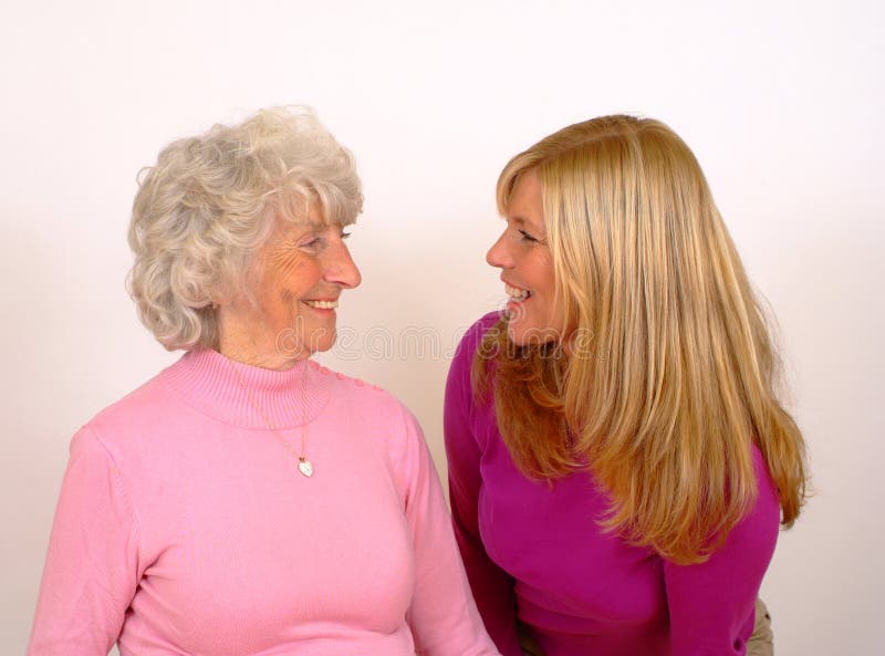 Mother And Daughter Smiling