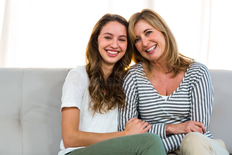 Mother and Daughter on Bed Smiling at Camera Stock Image - Image of ...