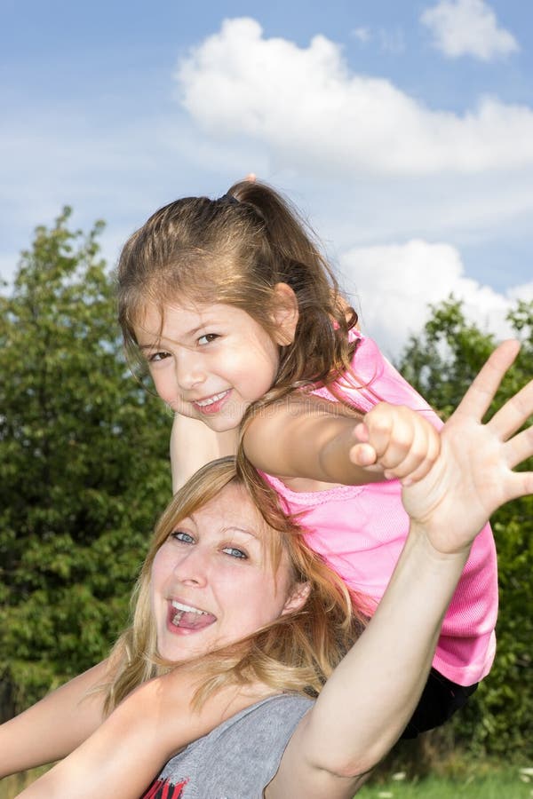 Mom Takes Daughter To Practice Stock Image - Image of family, curls