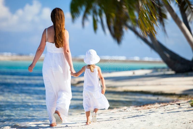 Mother and daughter on tropical vacation