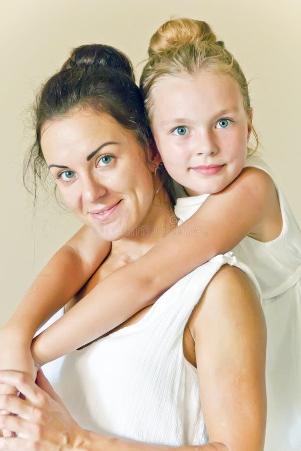 Mother and Daughter in White Stock Image - Image of parent, child: 58958581