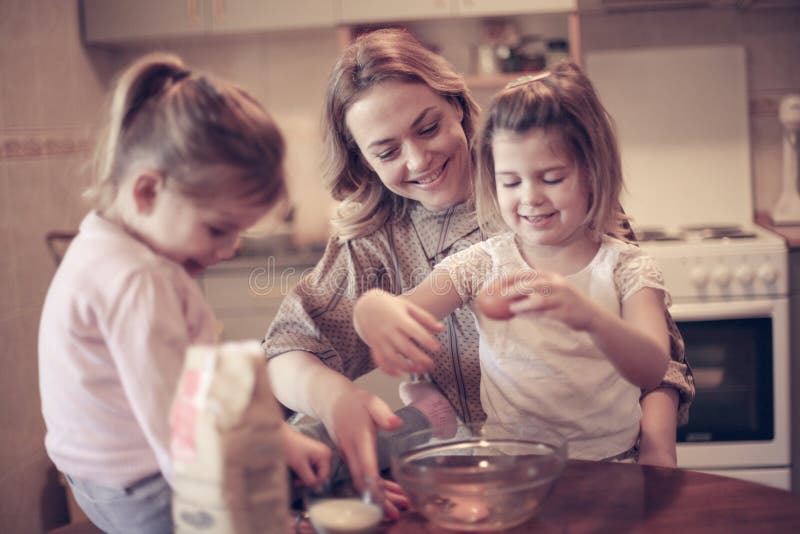 Mother and Daughters Baking. Stock Image Image of help, built 98619169