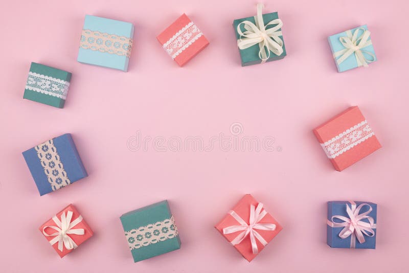 Mother day, Festive, birthday, Gift pastel minimal background. Multicolored Gift boxes on pink background. Gift, present concept stock photos Mother day, Festive, birthday, Gift pastel minimal background. Multicolored Gift boxes on pink background. Gift, present concept stock photos