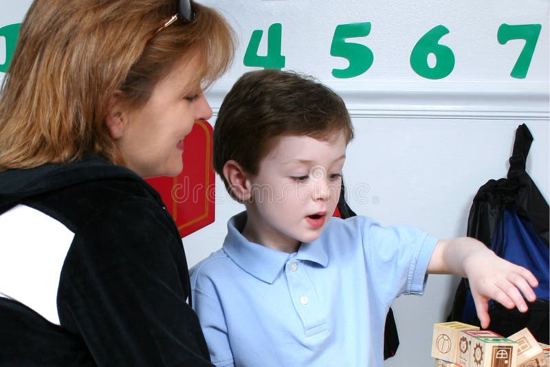 Mother Droping Son Off At Preschool