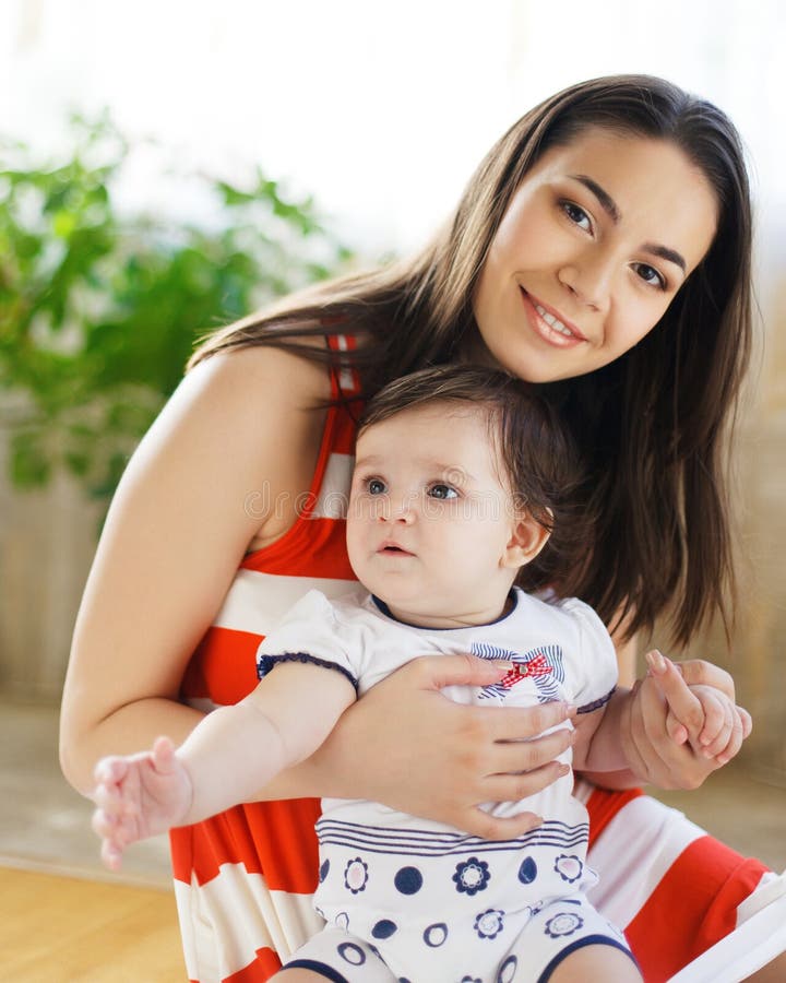 Mother with Eight Month Old Baby Girl Stock Photo - Image of childhood