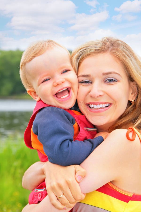 Mother embraces child