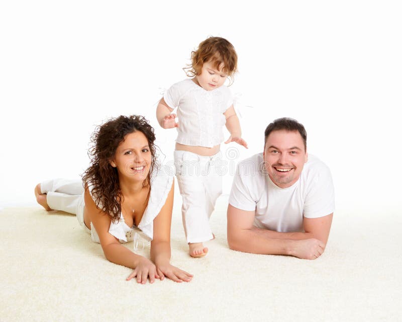 Mother, father and their child together in studio