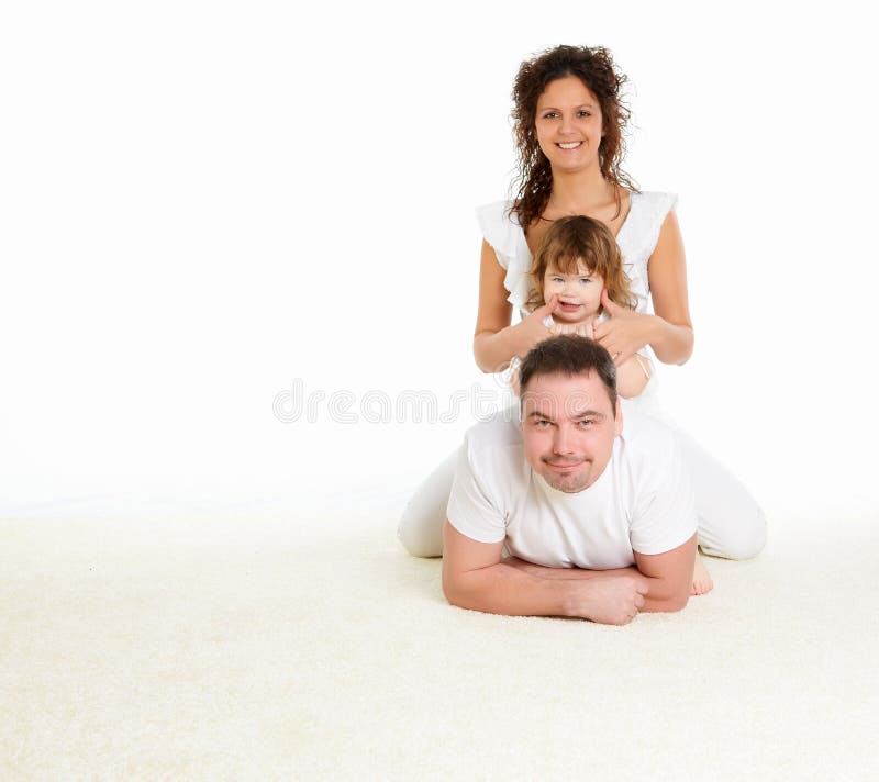 Mother, father and their child together in studio