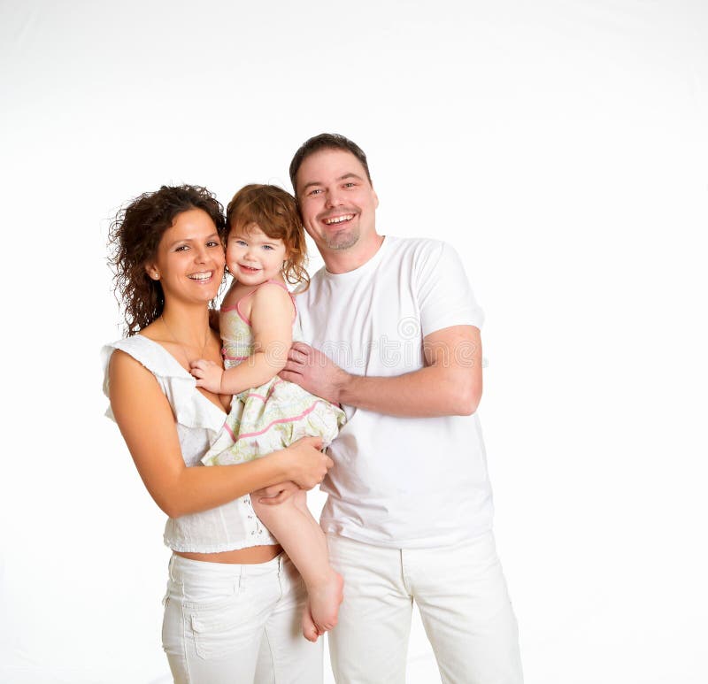 Mother, father and their child together in studio