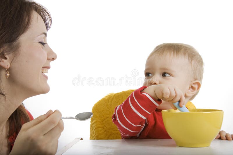 Mother feeding her baby