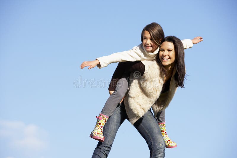 Portrait of young mother giving her son a piggyback ride, Stock Photo,  Picture And Royalty Free Image. Pic. WES-DGOF00925