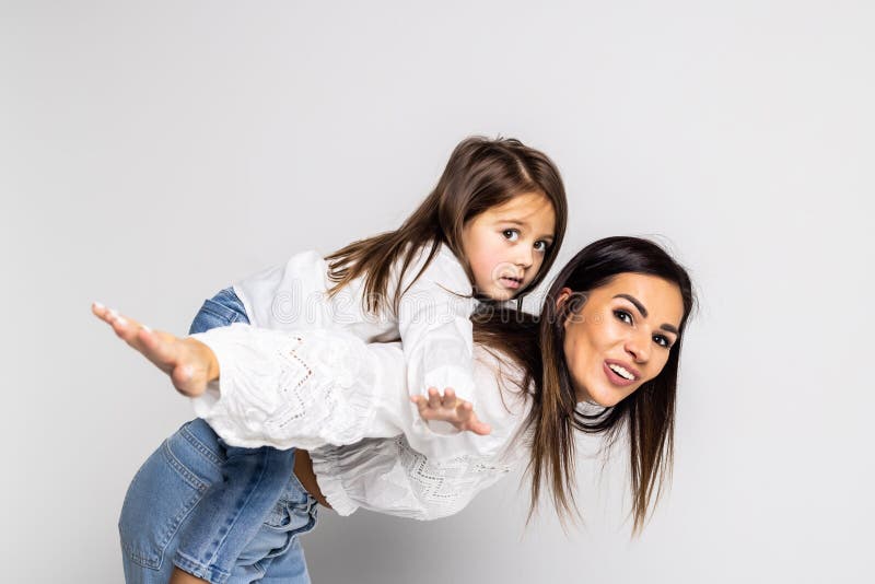 Portrait of young mother giving her son a piggyback ride, Stock Photo,  Picture And Royalty Free Image. Pic. WES-DGOF00925