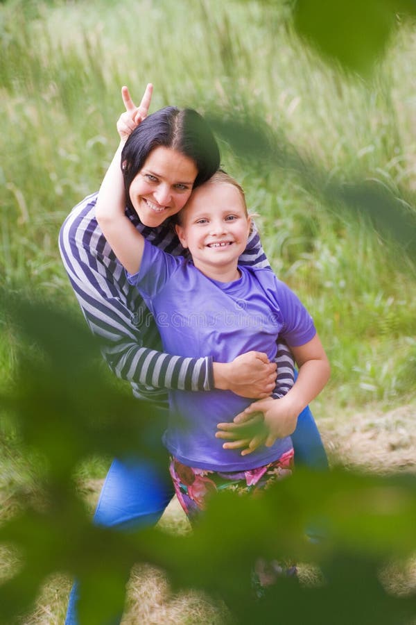 The mother having fun with her daugther