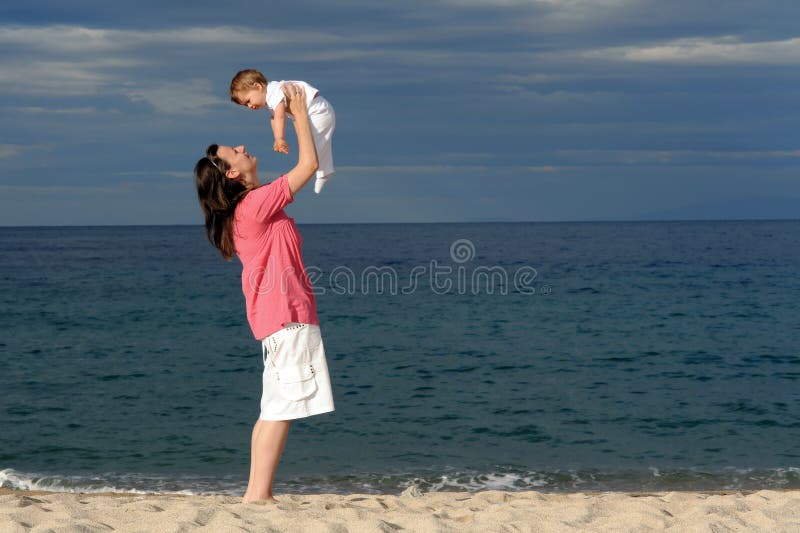 Mother with her baby at beach