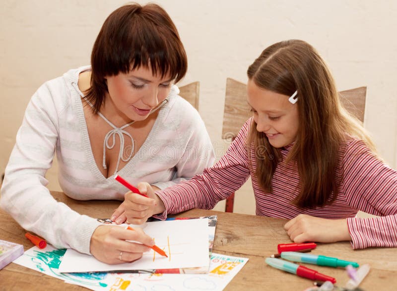 Mother and Her Daughter Drawing. Stock Image - Image of draw, female