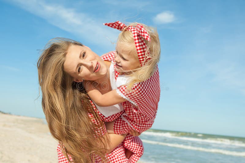 Mother And Her Daughter Having Fun On The Beach Stock Image Image Of Beautiful Motherhood 