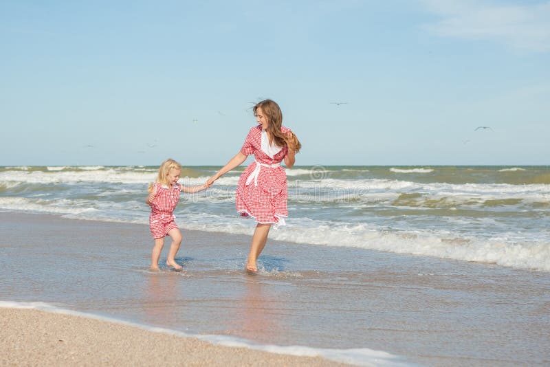 Mother And Her Daughter Having Fun On The Beach Stock Image Image Of Beautiful Joyful 60026519 