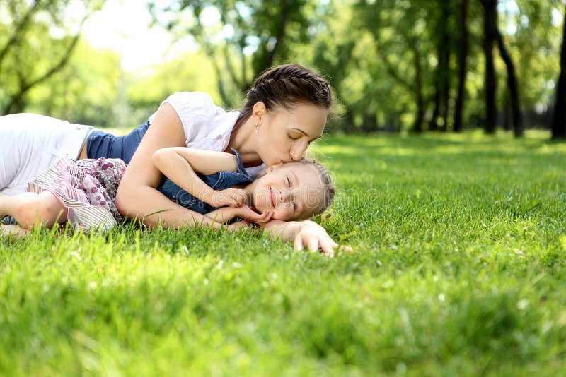 Mother with her daughter outside