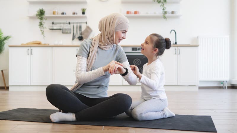 Mother and Her Girl Taking Advantages of Home Training Using Fitness Tracker. Stock Video Video of active workout 297187263